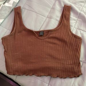 woman’s brown tank top, notch neck